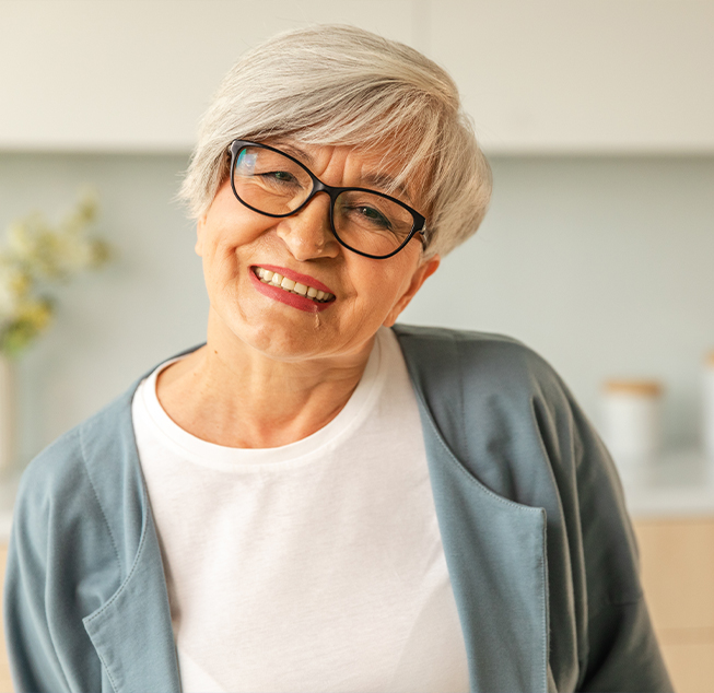 Smiling senior woman with glasses