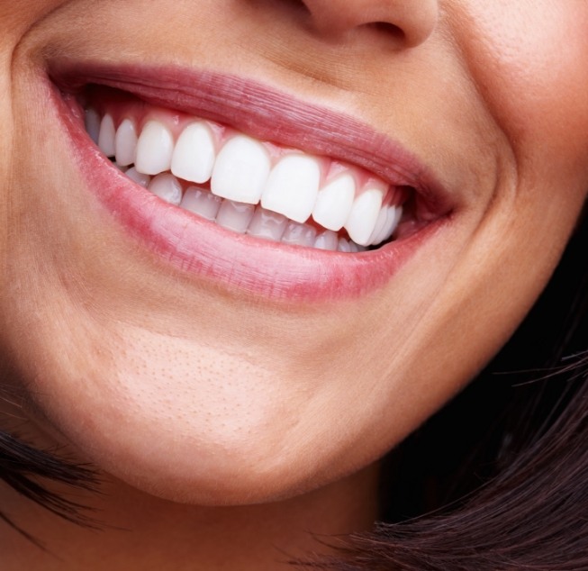 Close up of smile with straight white teeth