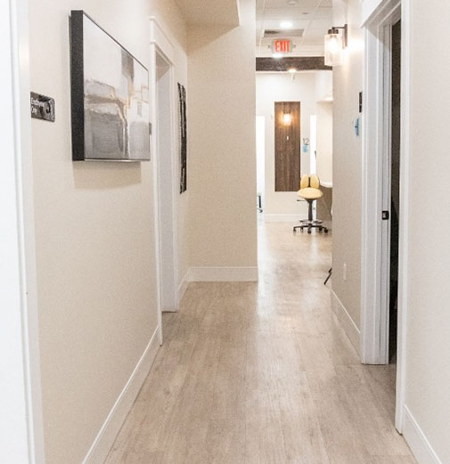 Hallway leading to dental treatment rooms