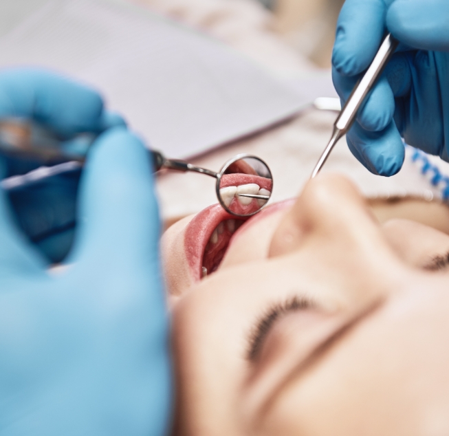 Close up of dental patient receiving treatment