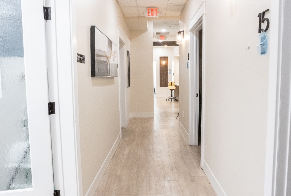 Hallway leading to dental treatment rooms in Hanford dental office