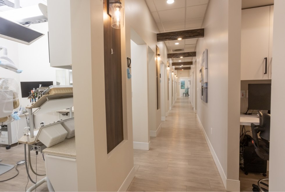 Hallway branching off into dental treatment rooms