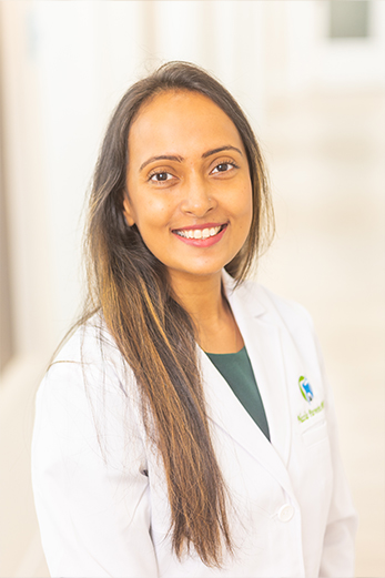 Hanford California dentist Doctor Nazia Parveen in white lab coat